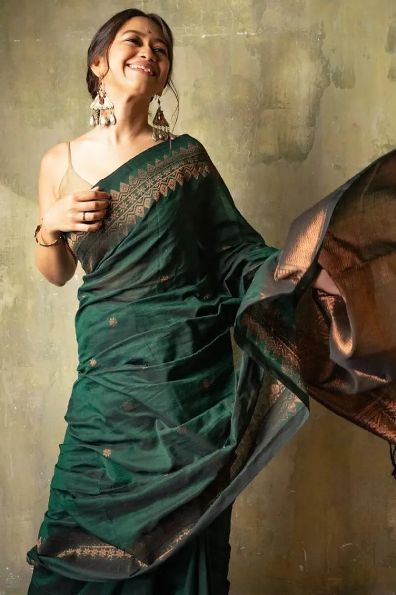 Piquant Dark Green Soft Silk Saree With Quixotic Blouse Piece