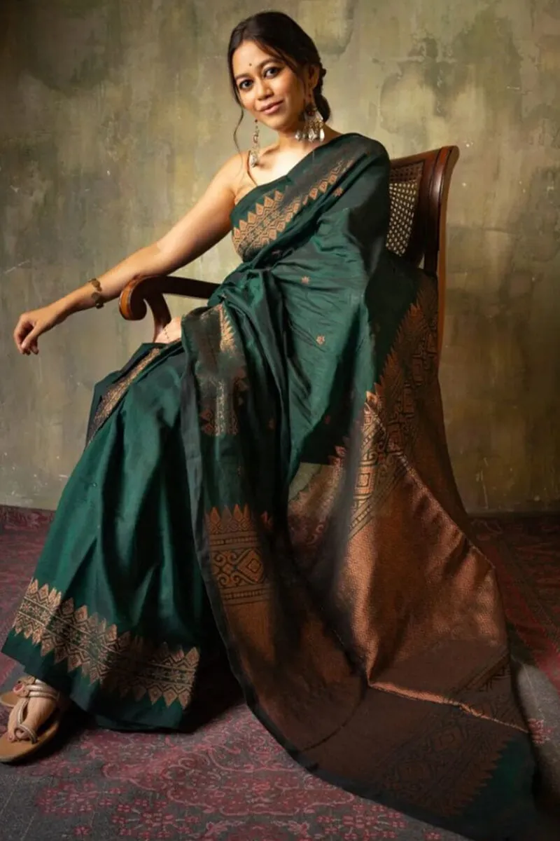 Piquant Dark Green Soft Silk Saree With Quixotic Blouse Piece