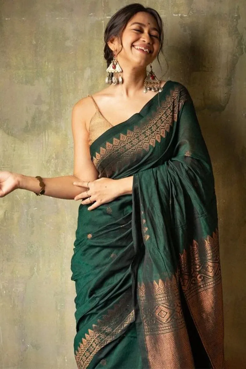 Piquant Dark Green Soft Silk Saree With Quixotic Blouse Piece